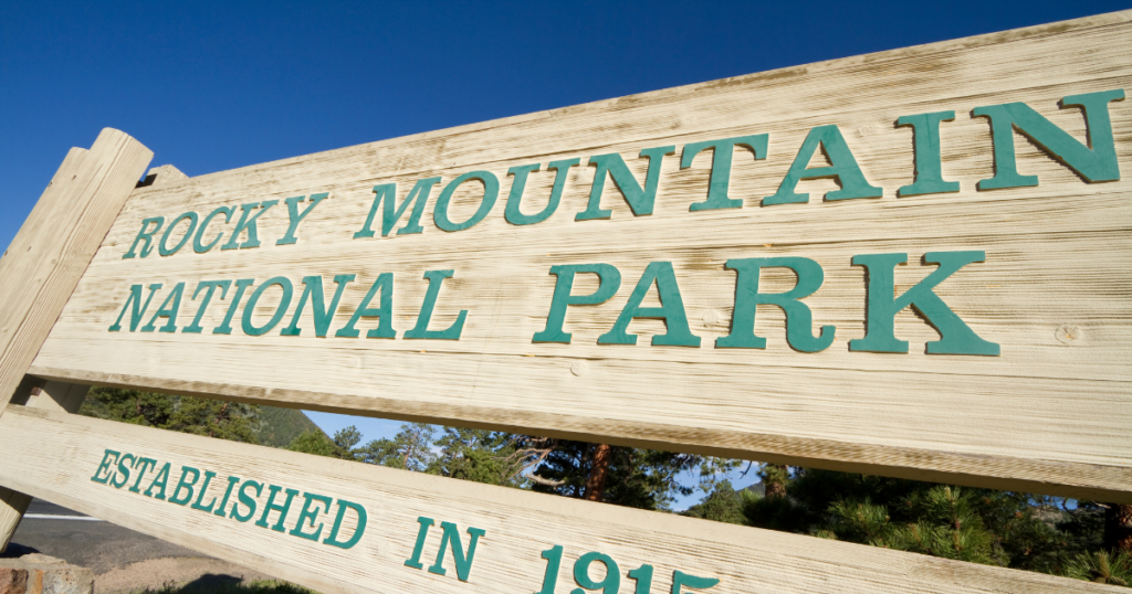 A Rocky Mountain National Park sign near Beaver Meadows Entrance in Estes Park, Colorado.
